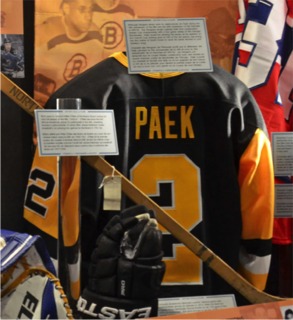HISTORIC HOIST: Jersey worn by Paek, a GTHL grad, when he assisted on the Stanley Cup-winning goal in 1992 to become the first player of South Korean descent to lift the Cup.