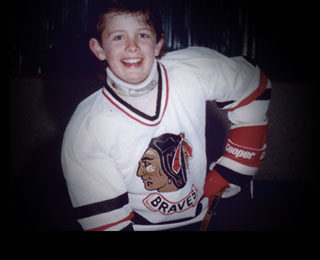 A young Jason Spezza in his Braves jersey.